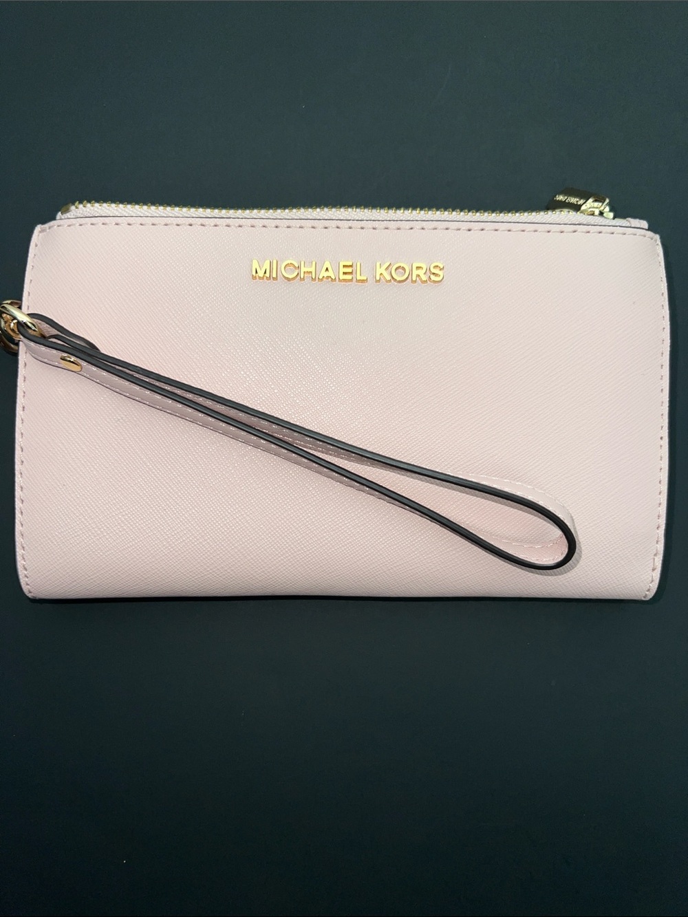 Michael Kors Light Pink Leather Wristlet with Gold Hardware